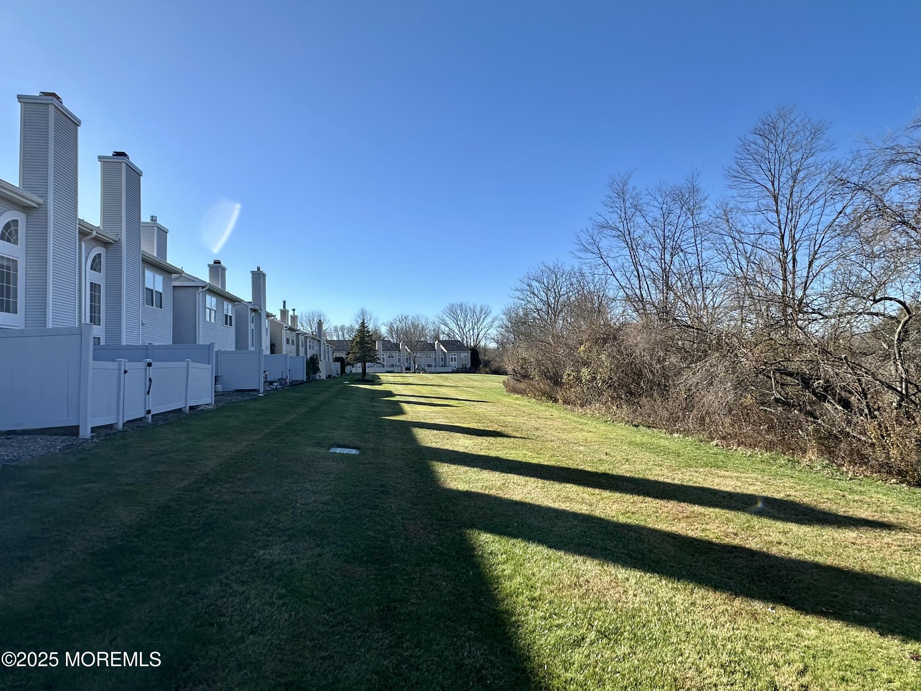 51 Picket Place Freehold, NJ 07728 - Photo 46 of 47 a view of a yard with an outdoor space