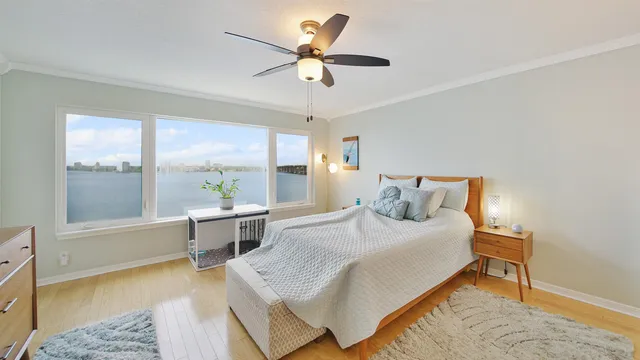 a roof deck with table and chairs