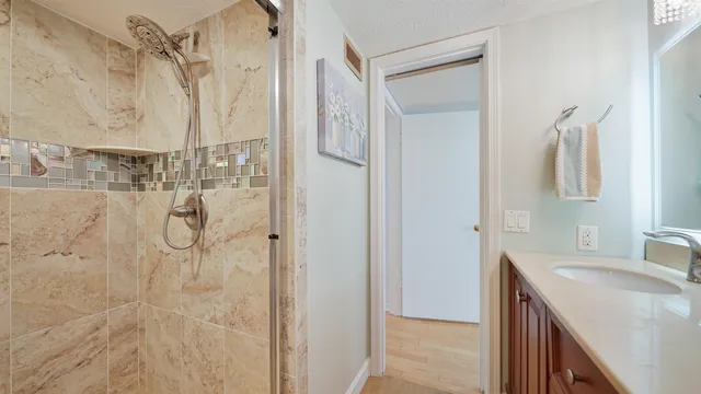 a view of a chairs and table in patio
