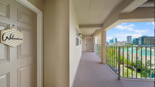 a kitchen with a refrigerator stove and white cabinets