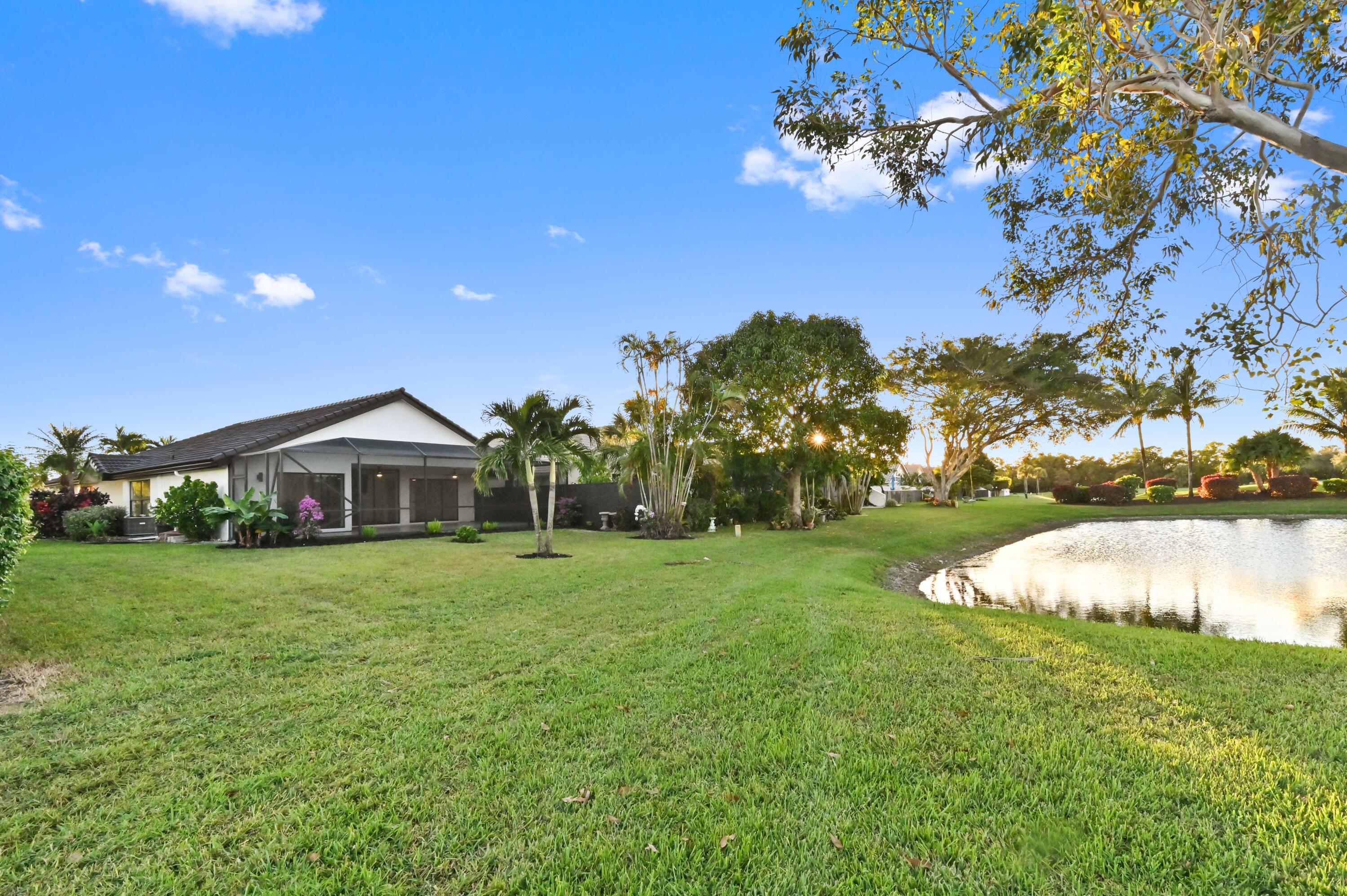 11294 Cloverleaf Circle Boca Raton, FL 33428 - Photo 36 of 81 a view of a house with a yard