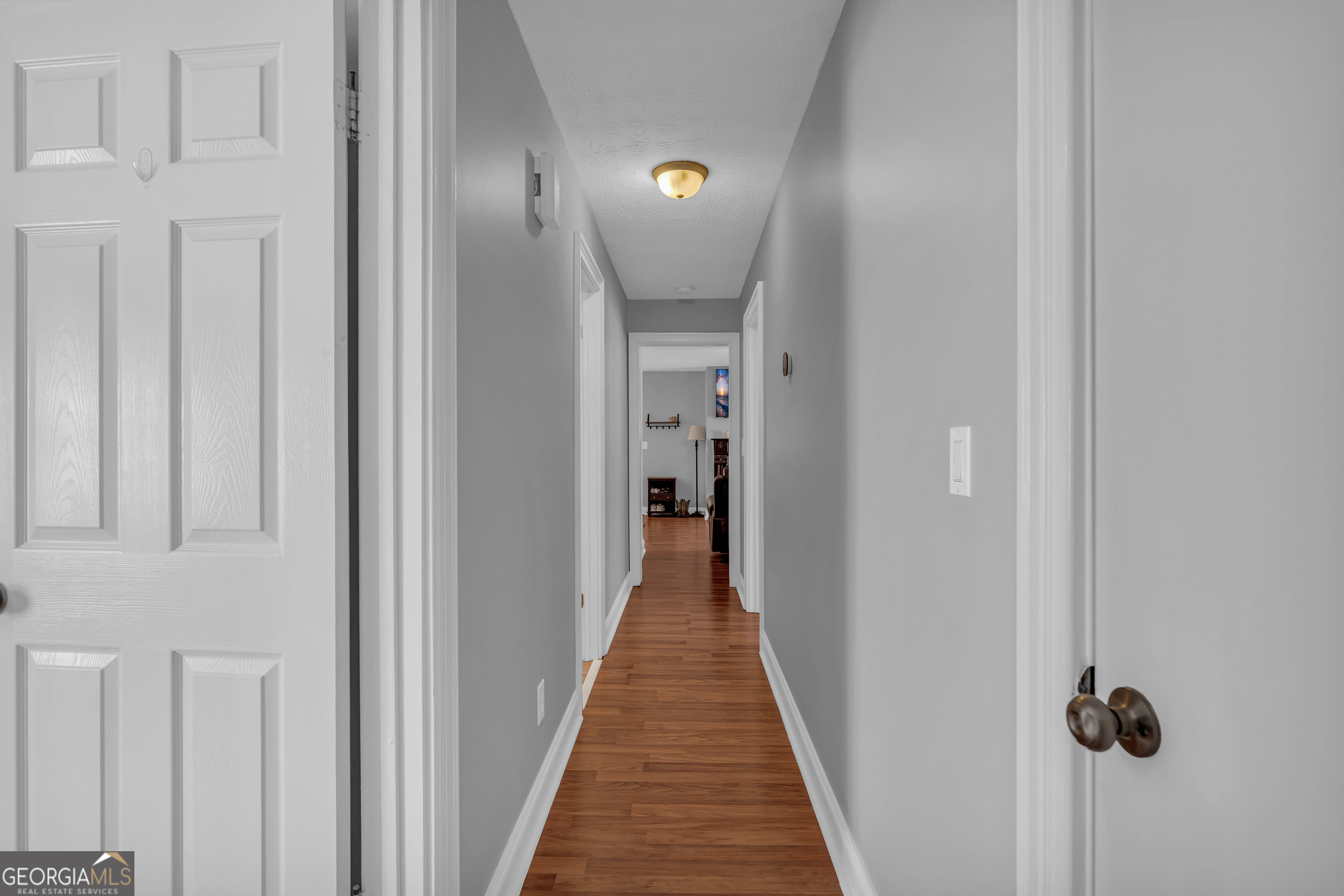 809 Parker Court Monroe, GA 30656 - Photo 30 of 55 a view of a hallway with wooden floor