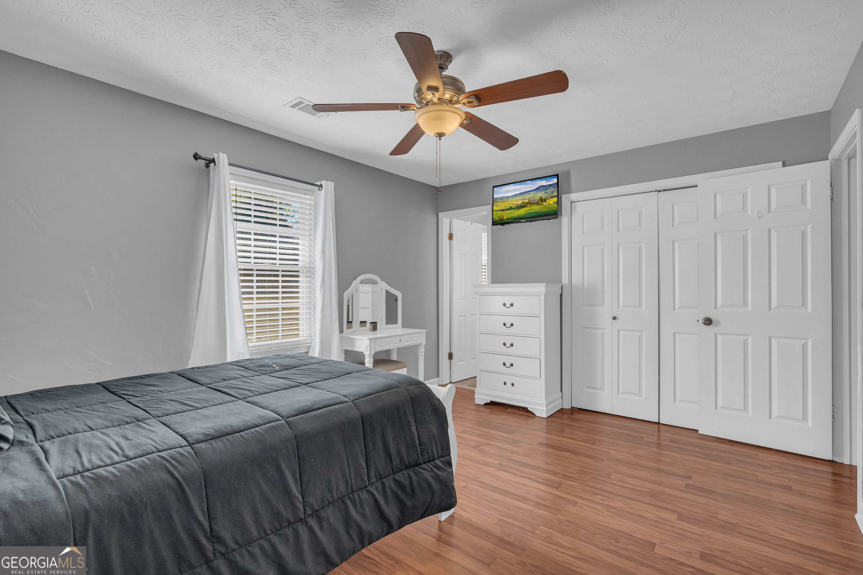 809 Parker Court Monroe, GA 30656 - Photo 34 of 55 a bedroom with a bed and a window