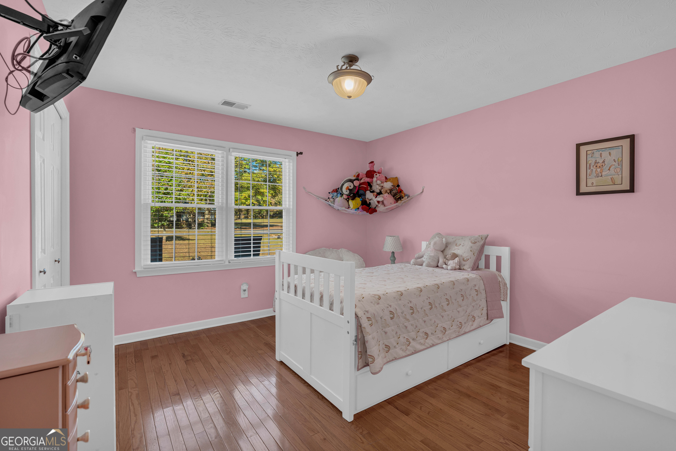 809 Parker Court Monroe, GA 30656 - Photo 37 of 55 a living room with furniture and a large window