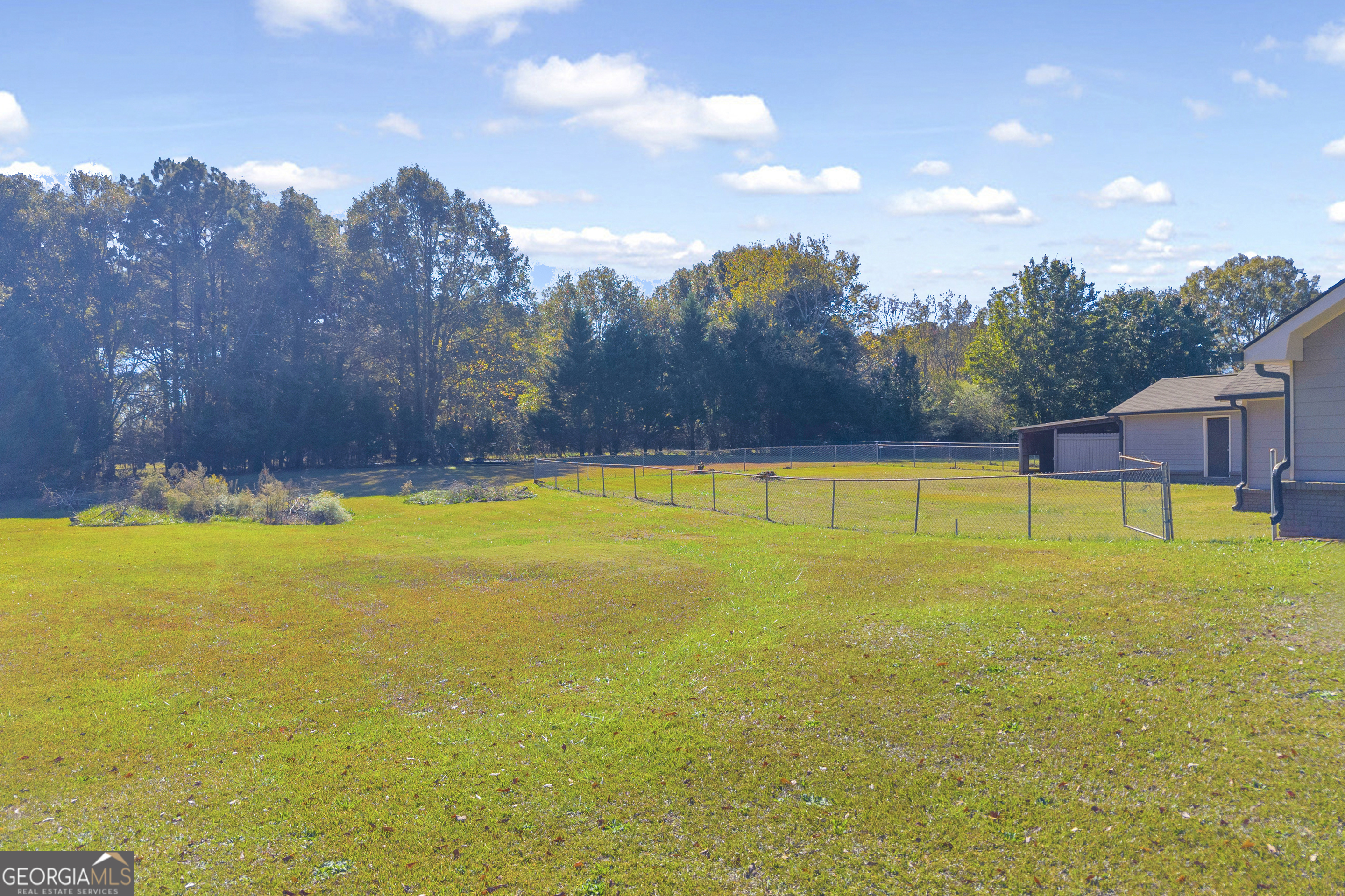 809 Parker Court Monroe, GA 30656 - Photo 48 of 55 a view of an outdoor space and swimming pool