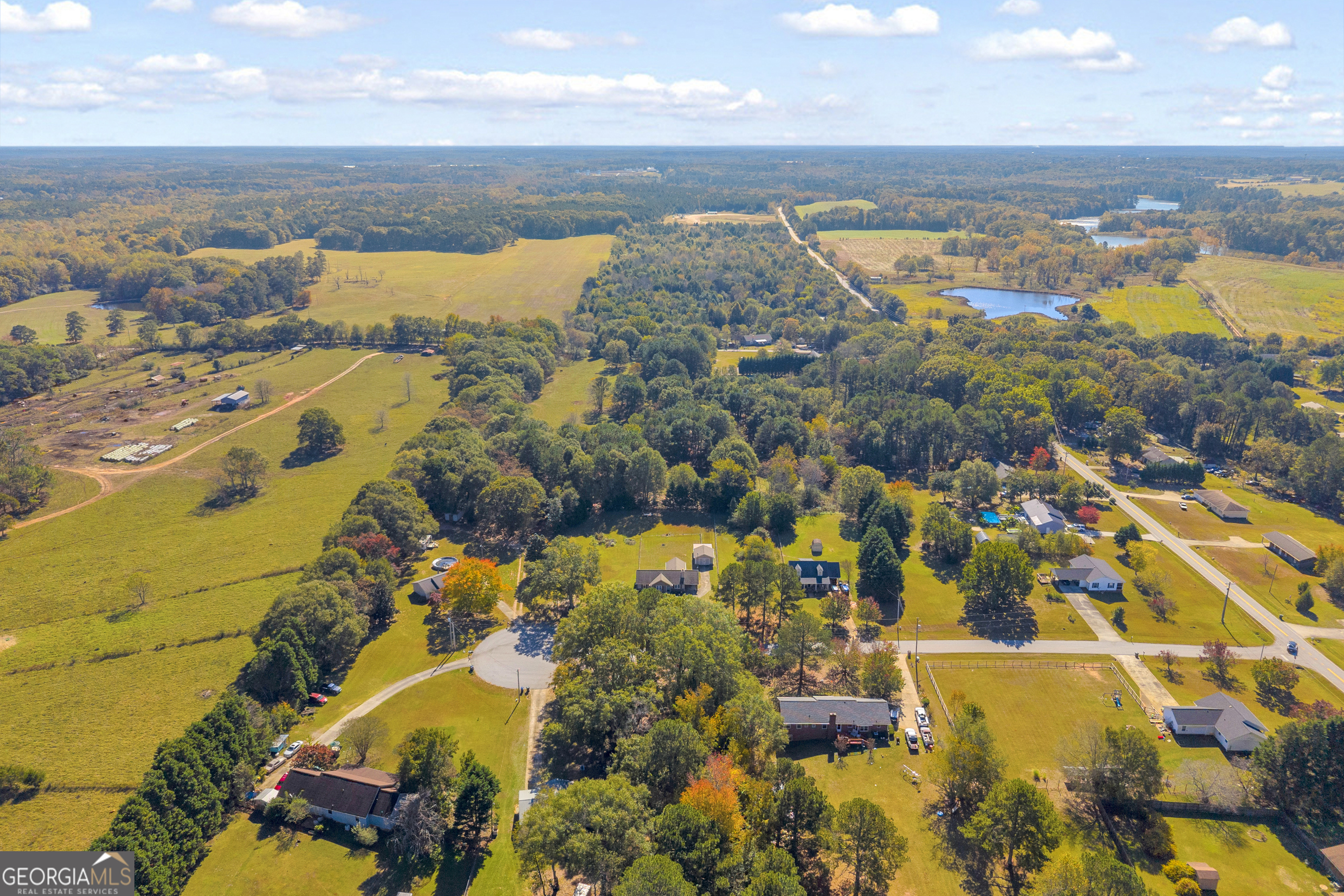 809 Parker Court Monroe, GA 30656 - Photo 51 of 55 an aerial view of residential building and lake view