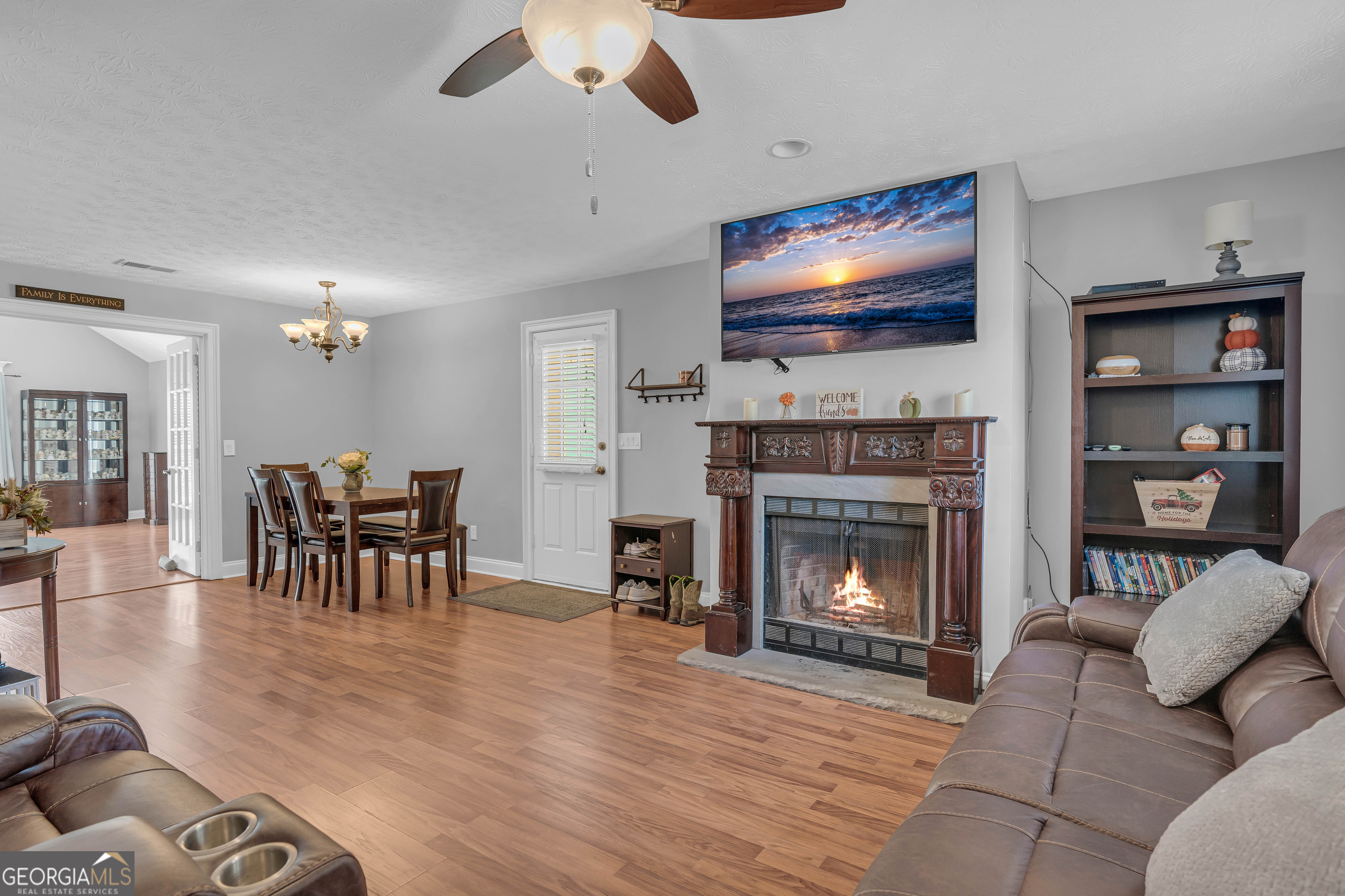 809 Parker Court Monroe, GA 30656 - Photo 9 of 55 a living room with furniture fireplace and flat screen tv