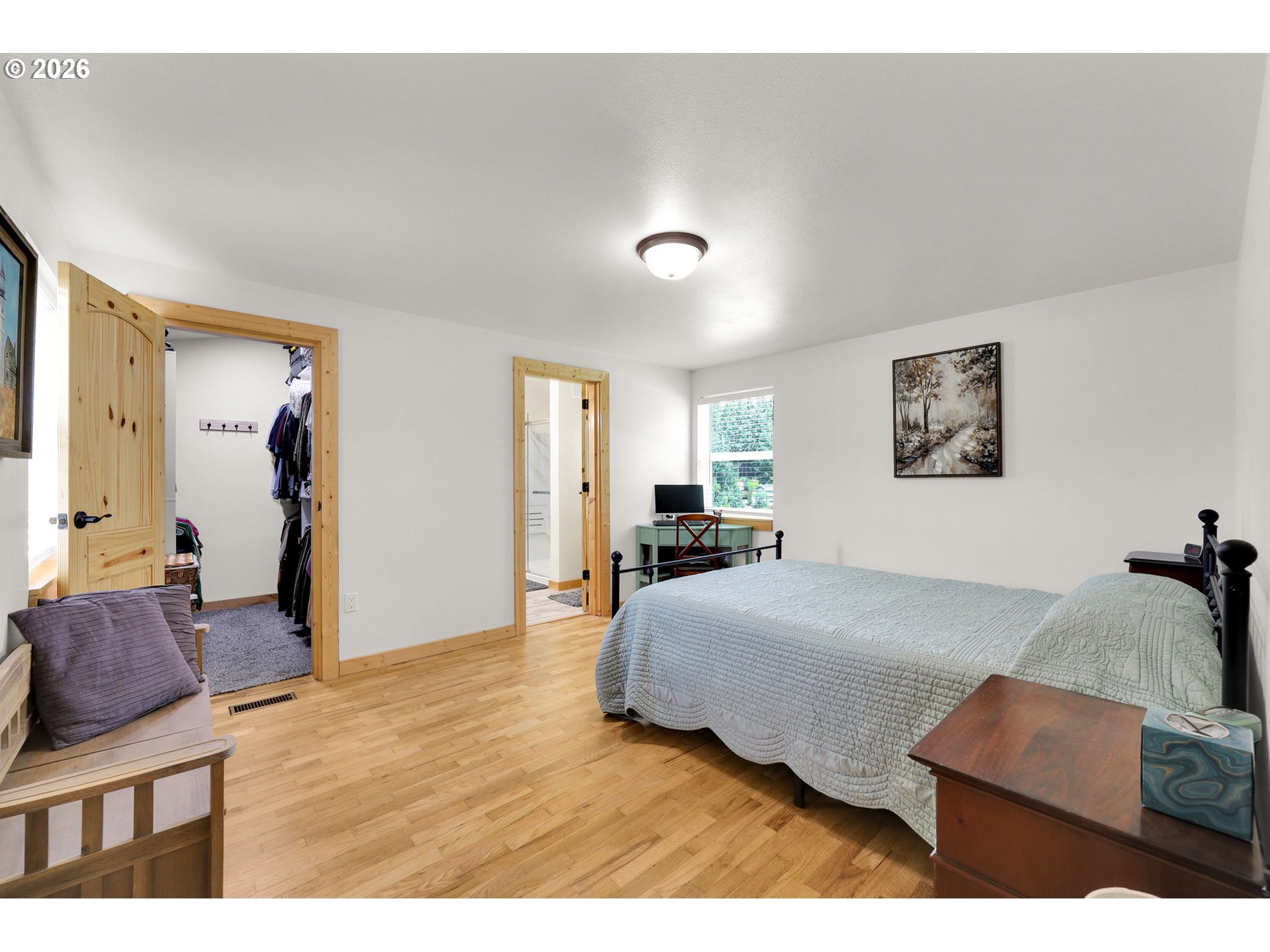 35478 Brabham Road Pleasant Hill, OR 97455 - Photo 14 of 48 a bedroom with a bed and wooden floor