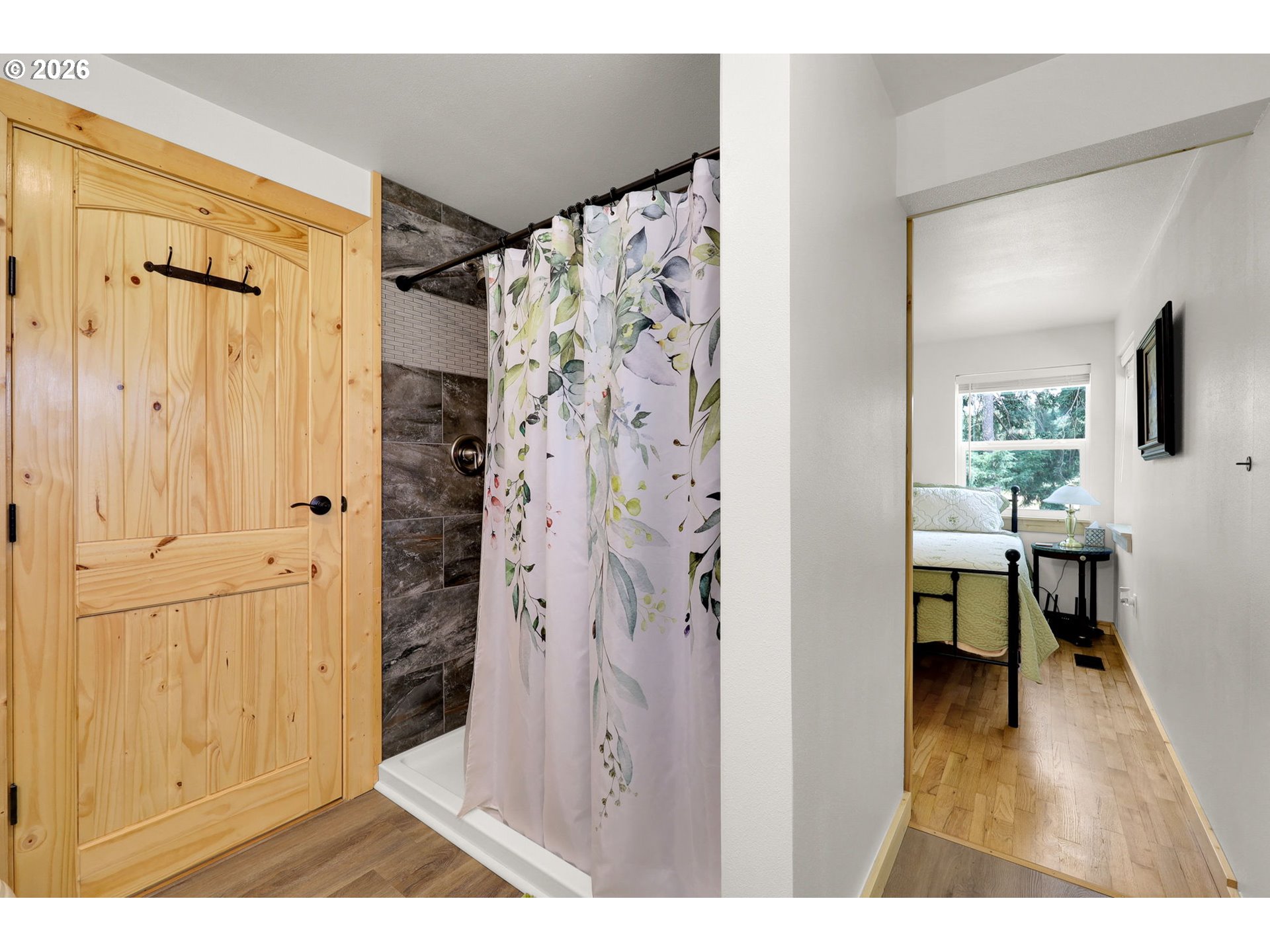 35478 Brabham Road Pleasant Hill, OR 97455 - Photo 24 of 48 a hallway with wooden floor and a bathroom