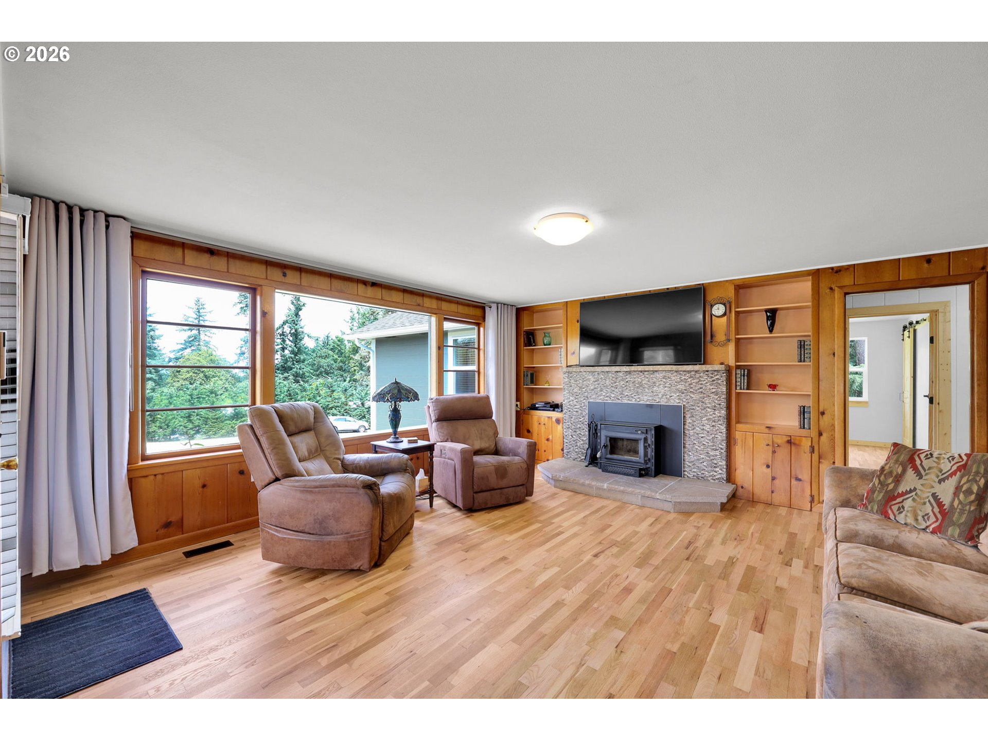35478 Brabham Road Pleasant Hill, OR 97455 - Photo 4 of 48 a living room with furniture and a fireplace