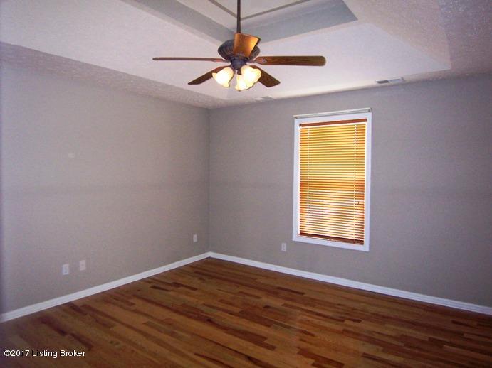 415 Ed Pile Road Bardstown, KY 40004 - Photo 15 of 33 Master Bedroom with decorative trey ceilings and lovely hardwood floors.