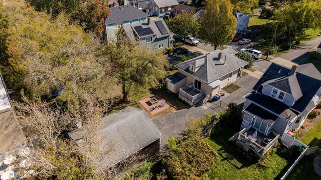an aerial view of residential house with outdoor space
