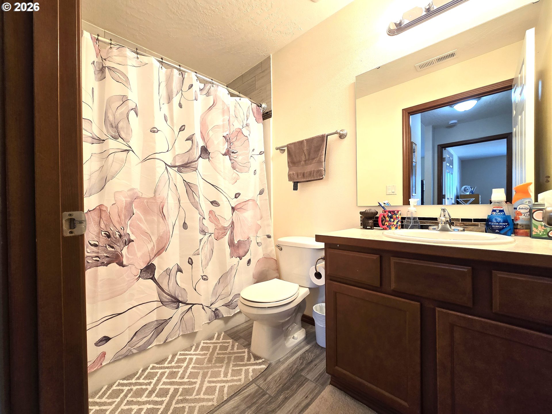 240 West Moore Avenue Hermiston, OR 97838 - Photo 14 of 19 a bathroom with a sink and a toilet