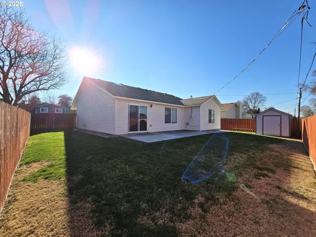 a view of a backyard with a garden