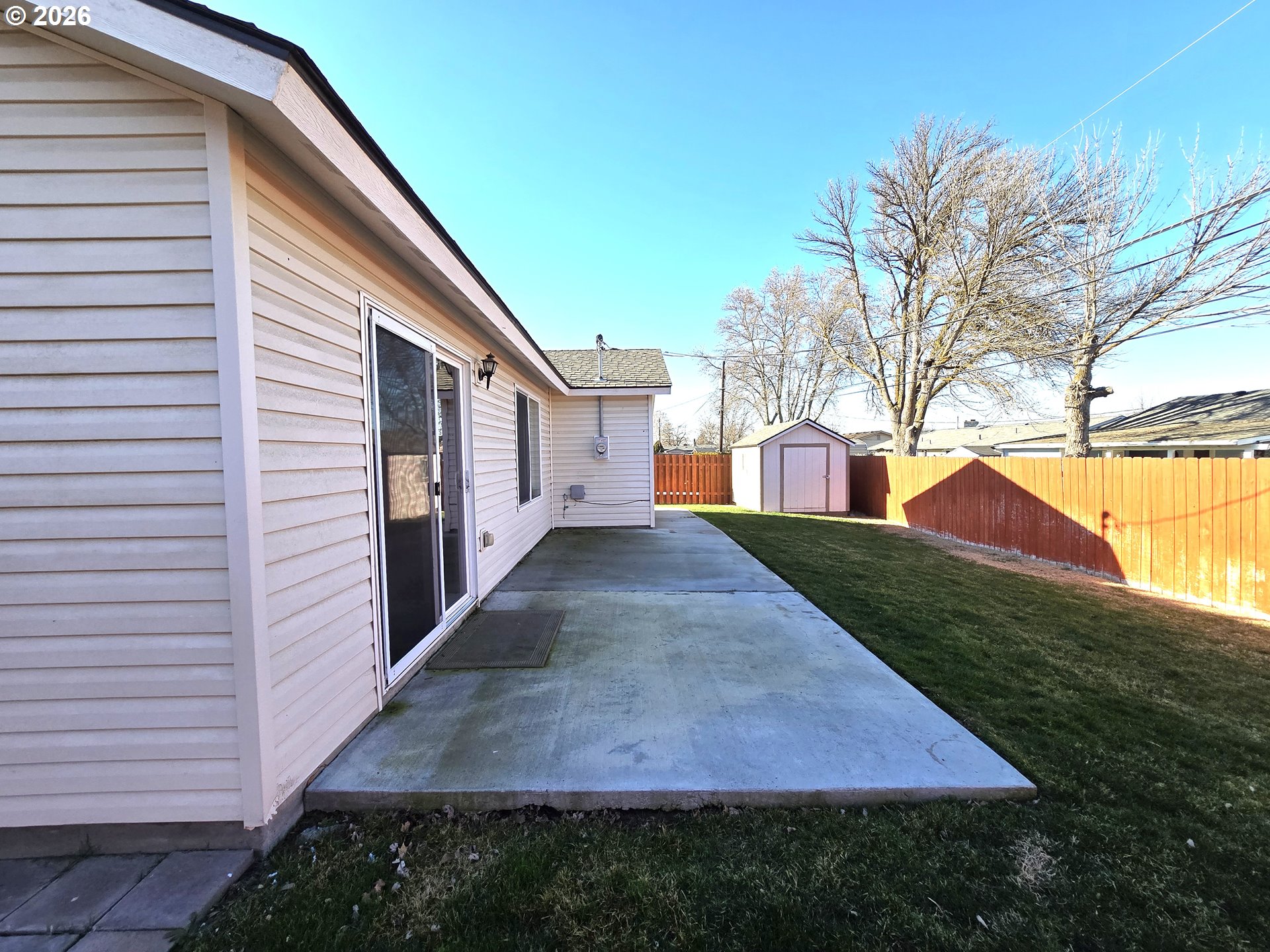 240 West Moore Avenue Hermiston, OR 97838 - Photo 17 of 19 a view of a house with a yard