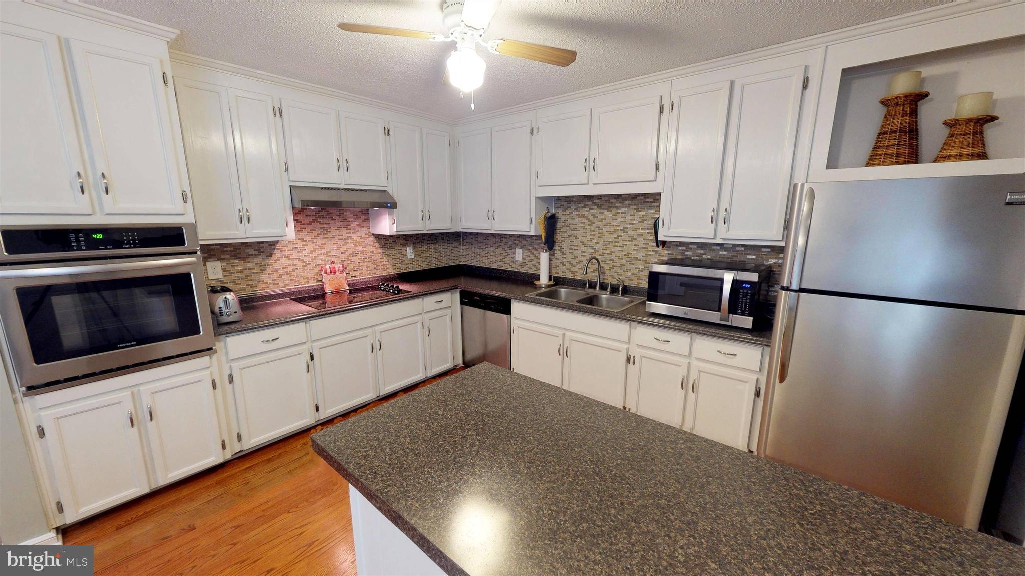 919 Swan Lane Ruther Glen, VA 22546 - Photo 11 of 30 Kitchen with Wall Oven and Cook-top