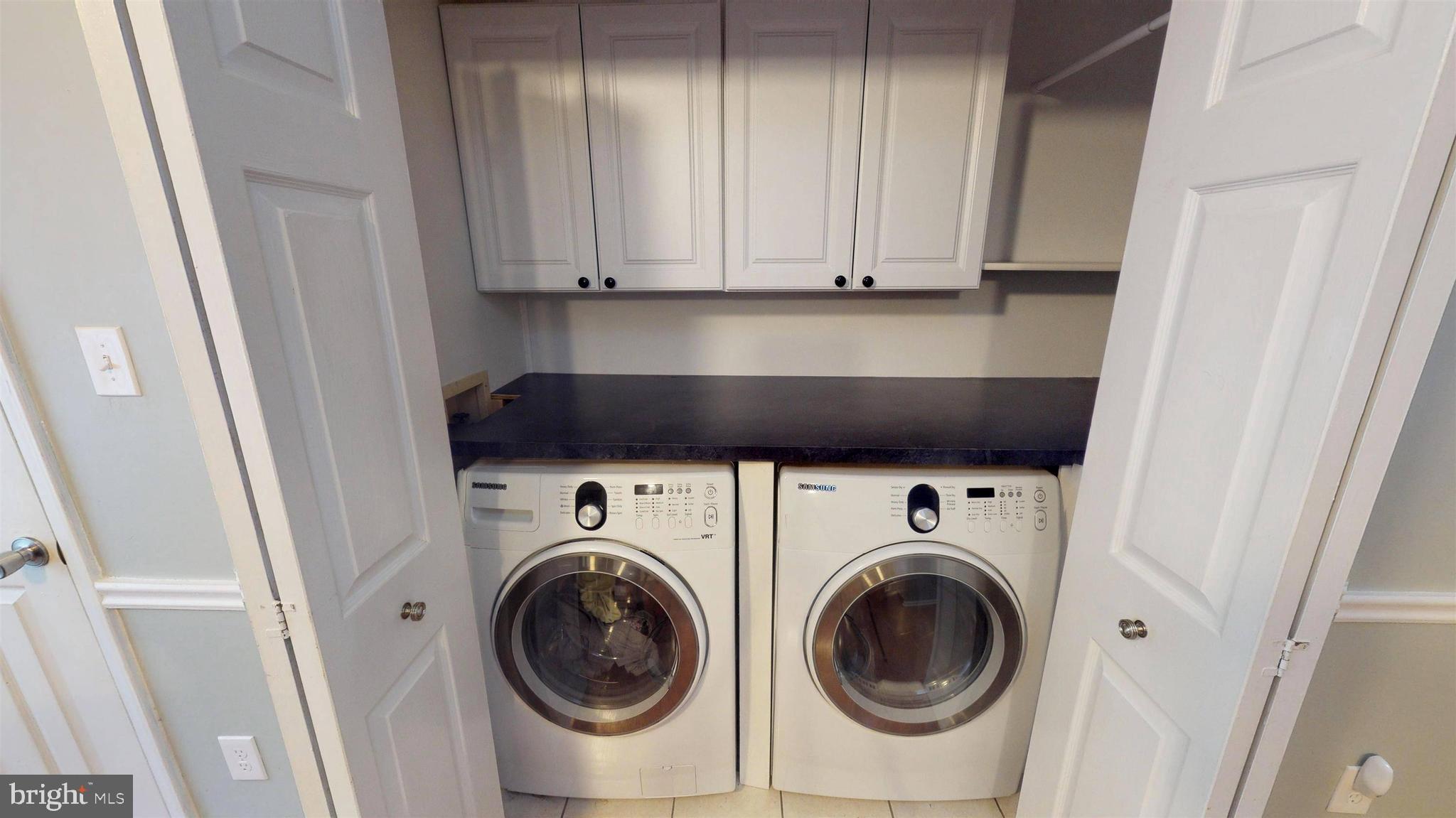 919 Swan Lane Ruther Glen, VA 22546 - Photo 26 of 30 Laundry Room with Front Loading Washer/Dryer