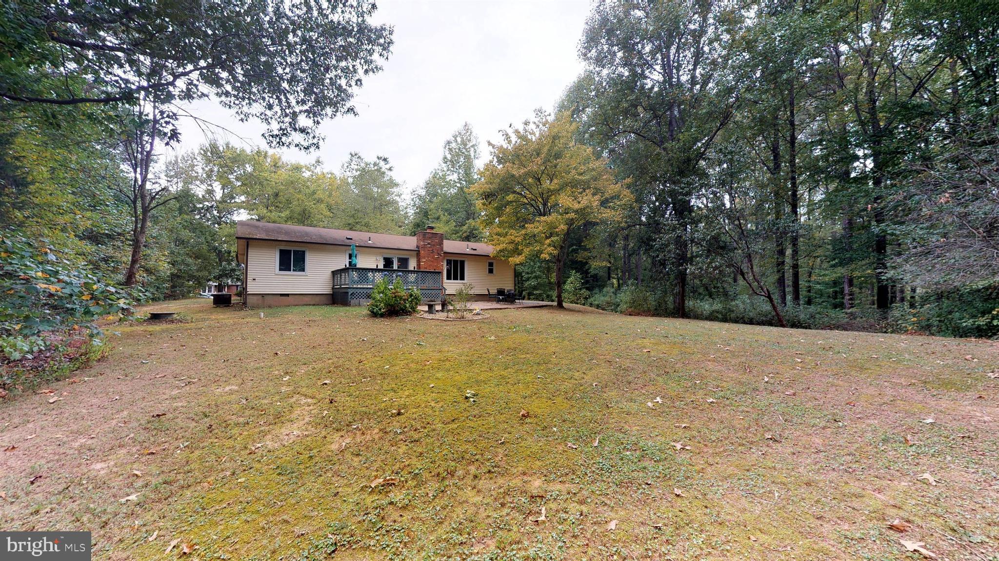 919 Swan Lane Ruther Glen, VA 22546 - Photo 27 of 30 Large Backyard surrounded by woods for privacy