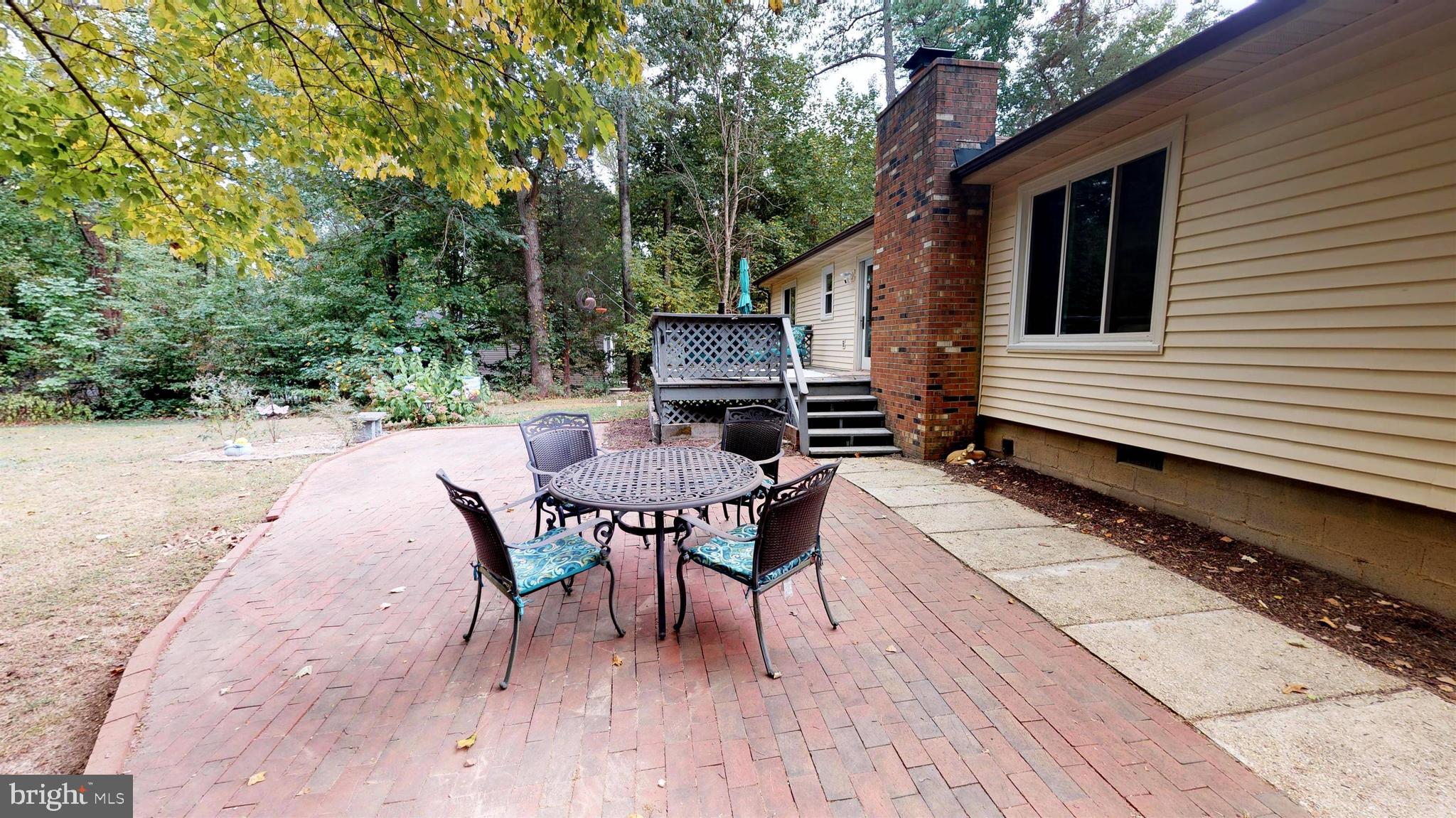 919 Swan Lane Ruther Glen, VA 22546 - Photo 28 of 30 Brick Patio and Deck. Great for Entertaining
