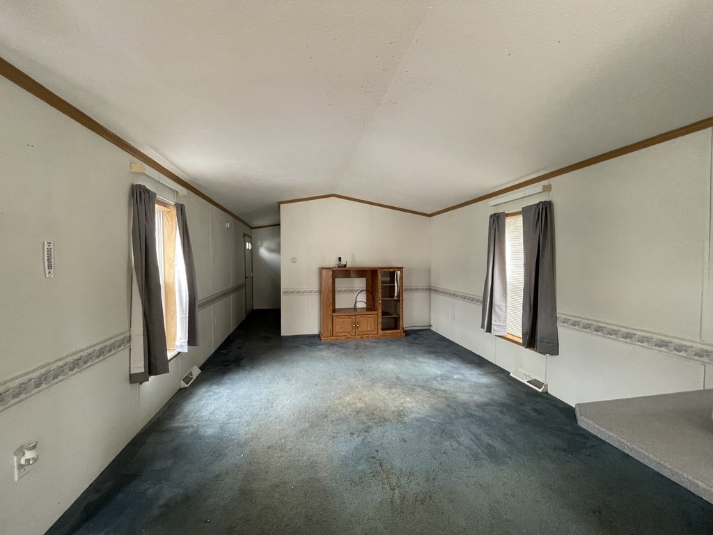 268 Palmer Road, Unit 12 Monson, MA 01057 - Photo 14 of 15 a view of an empty room with window