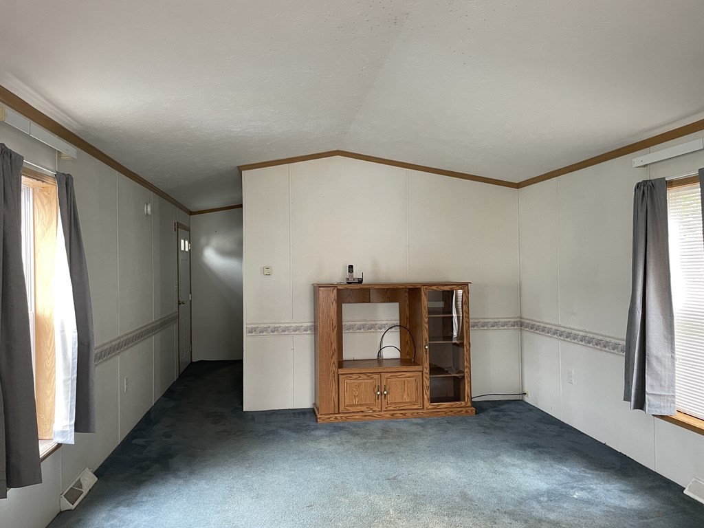 268 Palmer Road, Unit 12 Monson, MA 01057 - Photo 15 of 15 an empty room with windows
