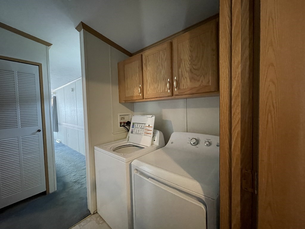 268 Palmer Road, Unit 12 Monson, MA 01057 - Photo 10 of 15 a utility room with dryer and washer
