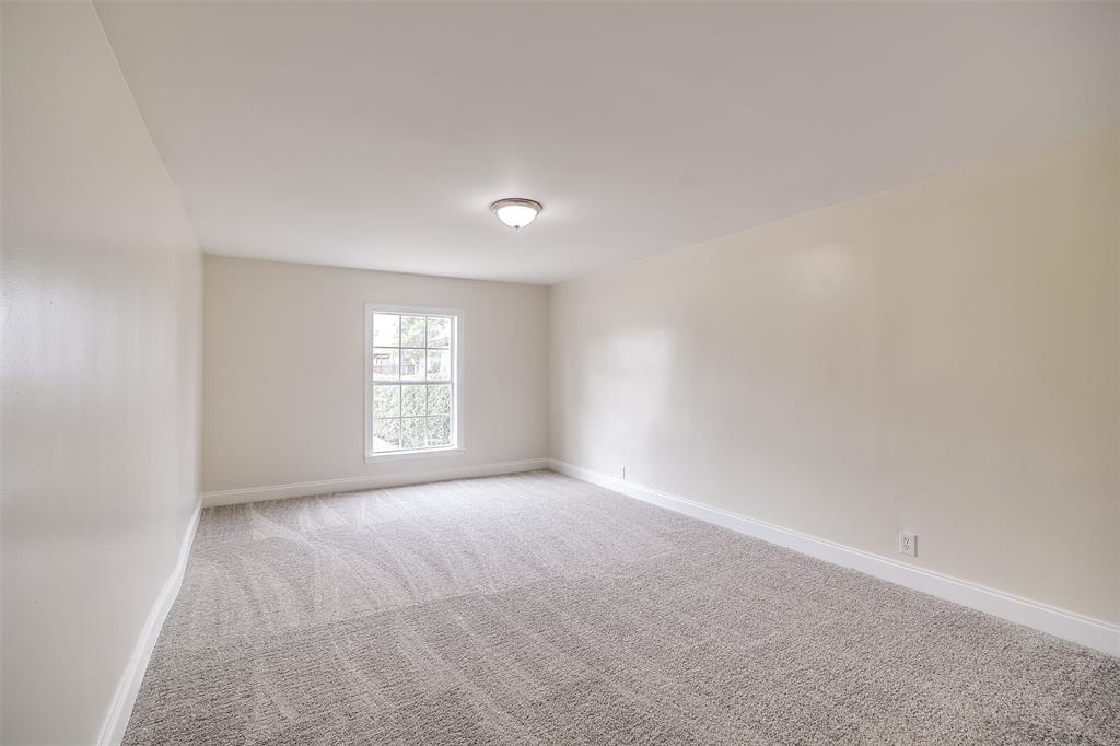 3071 Larry Drive Dallas, TX 75228 - Photo 10 of 16 a view of an empty room with a window