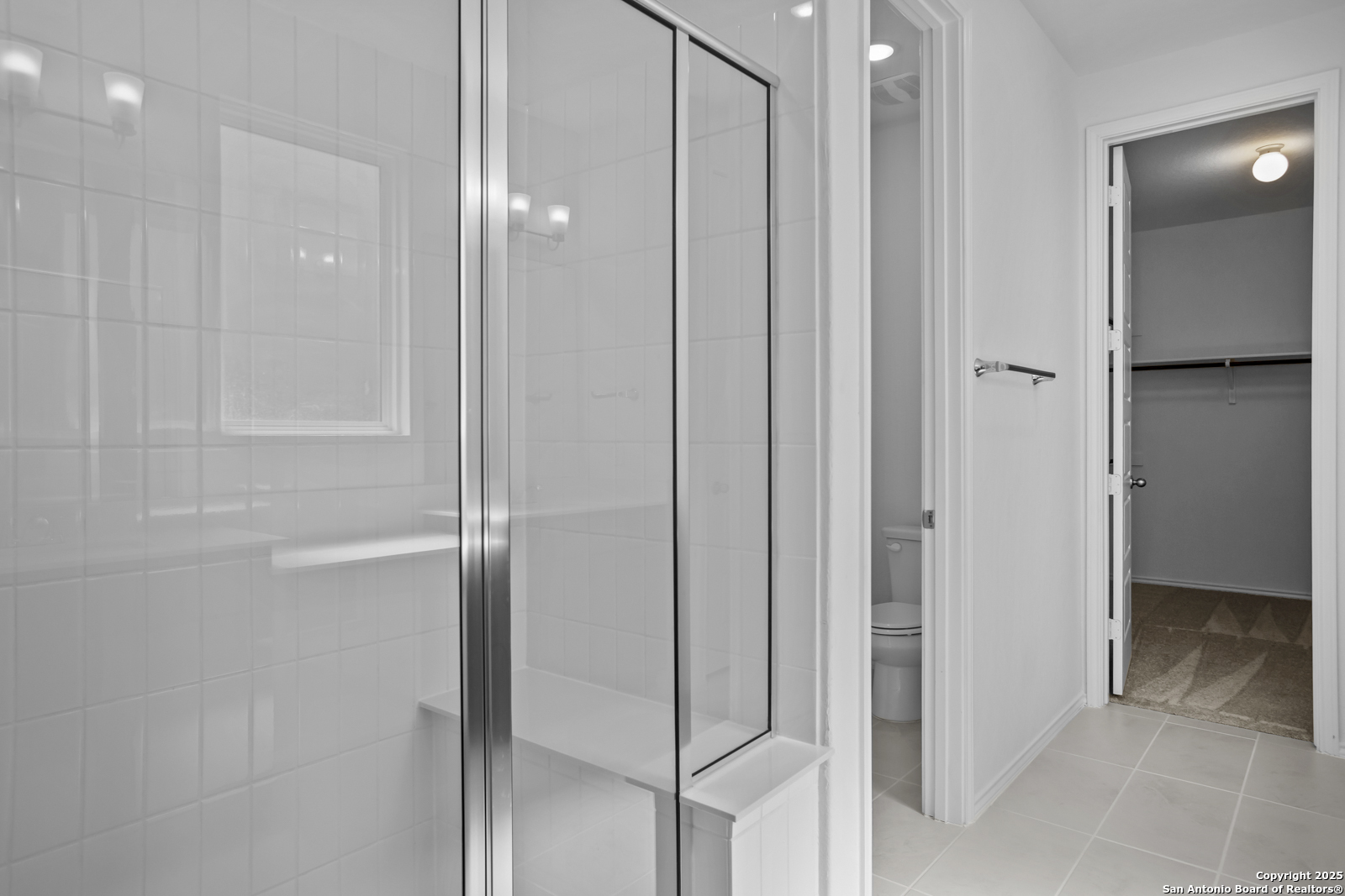 517 Foxtail Canyon Cibolo, TX 78108 - Photo 20 of 38 a bathroom with a shower and a glass door