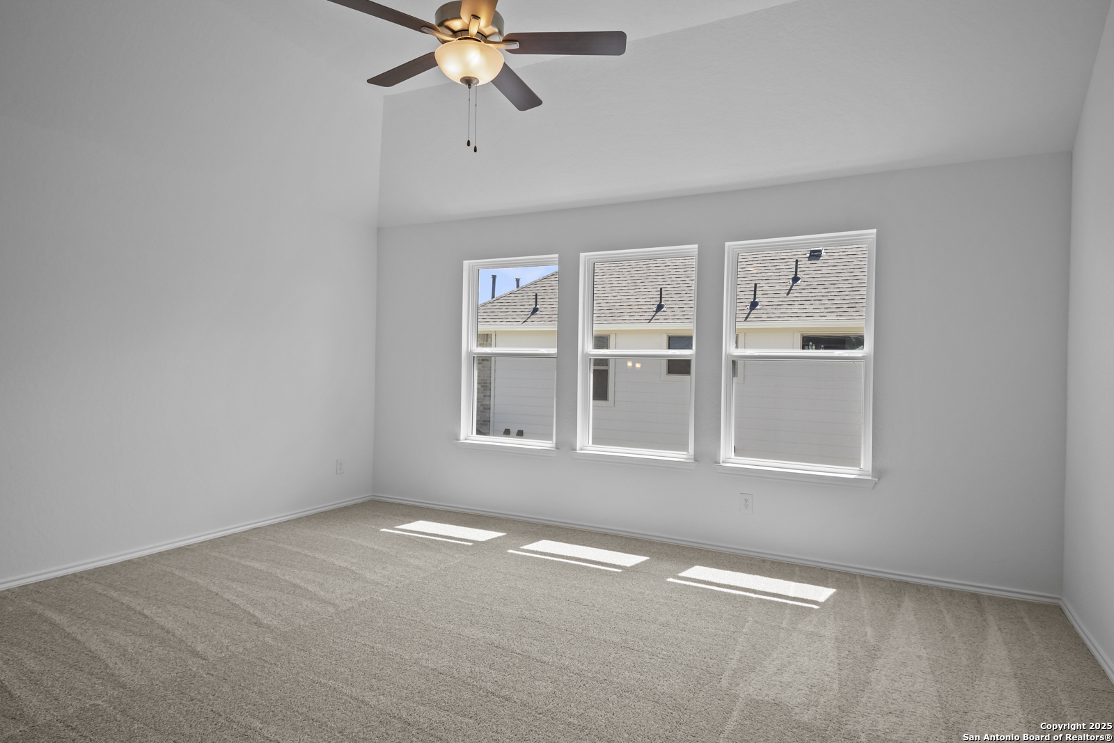 517 Foxtail Canyon Cibolo, TX 78108 - Photo 25 of 38 an empty room with windows and fan view