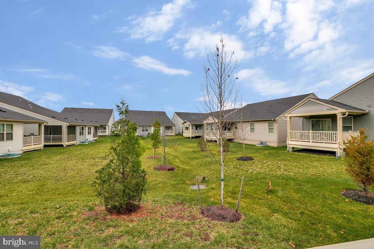 14380 Longhouse Loop Brandywine, MD 20613 - Photo 16 of 35 a front view of a house with garden
