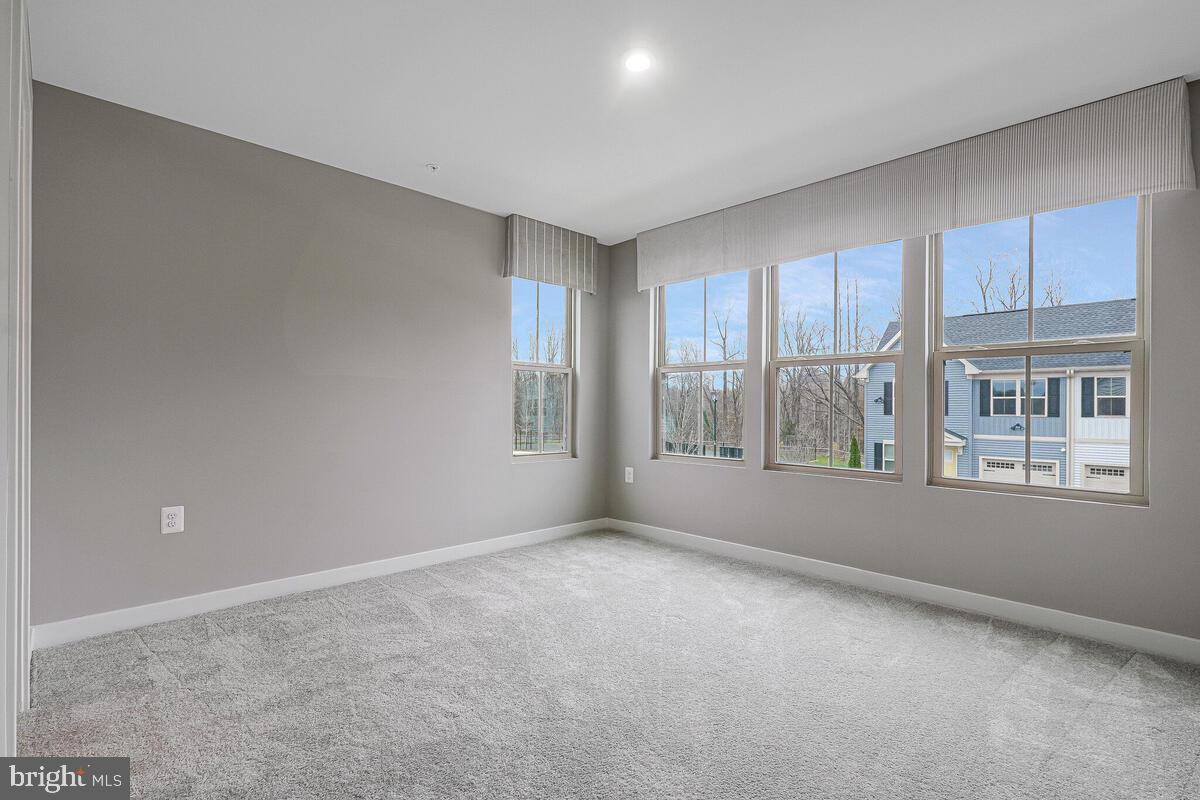 14380 Longhouse Loop Brandywine, MD 20613 - Photo 23 of 35 a view of an empty room with a window