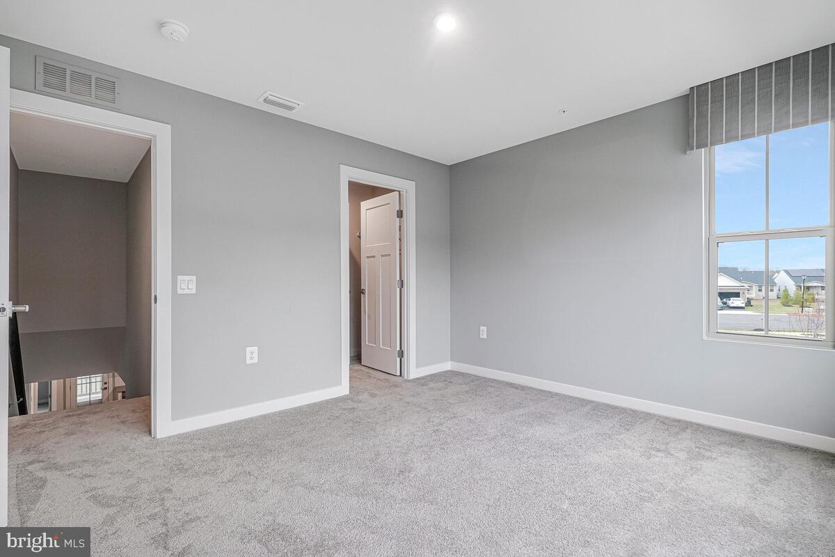 14380 Longhouse Loop Brandywine, MD 20613 - Photo 24 of 35 a view of an empty room with a window