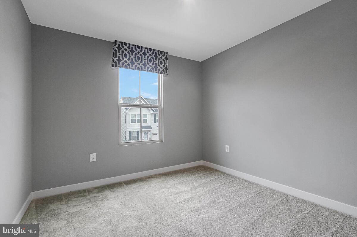 14380 Longhouse Loop Brandywine, MD 20613 - Photo 29 of 35 a view of an empty room with a window