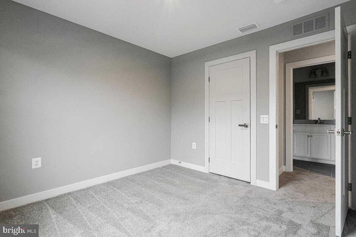 14380 Longhouse Loop Brandywine, MD 20613 - Photo 30 of 35 a view of an empty room