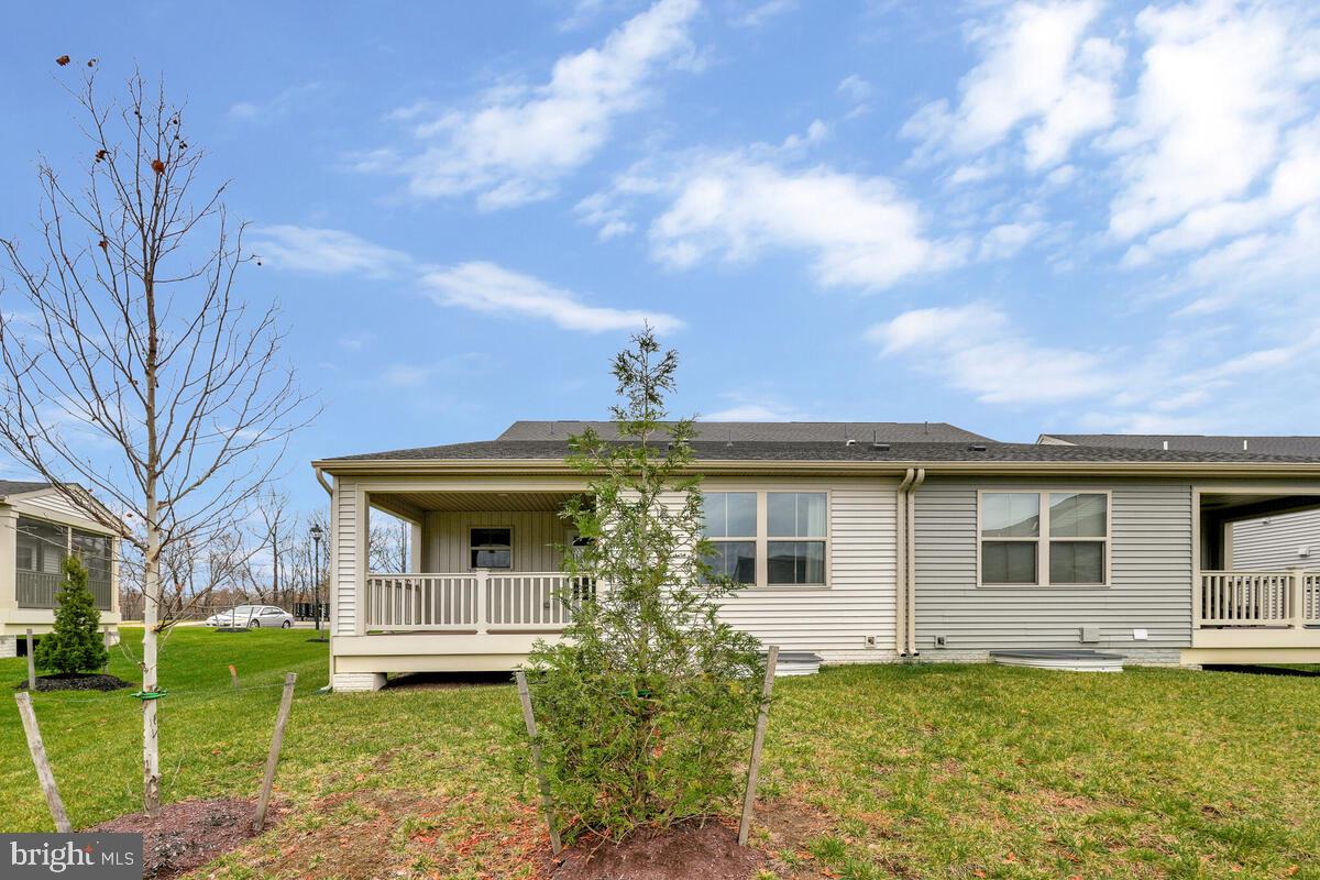 14380 Longhouse Loop Brandywine, MD 20613 - Photo 33 of 35 a front view of a house with garden