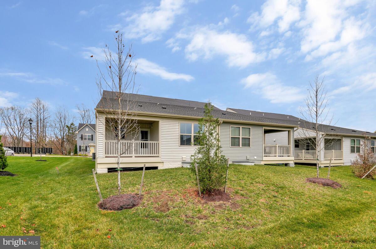 14380 Longhouse Loop Brandywine, MD 20613 - Photo 34 of 35 a view of a house with a yard