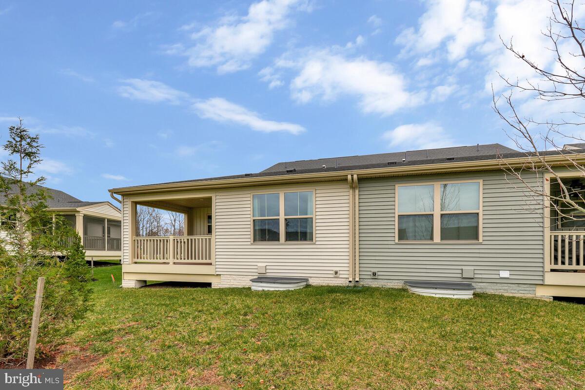 14380 Longhouse Loop Brandywine, MD 20613 - Photo 35 of 35 a front view of a house with a garden