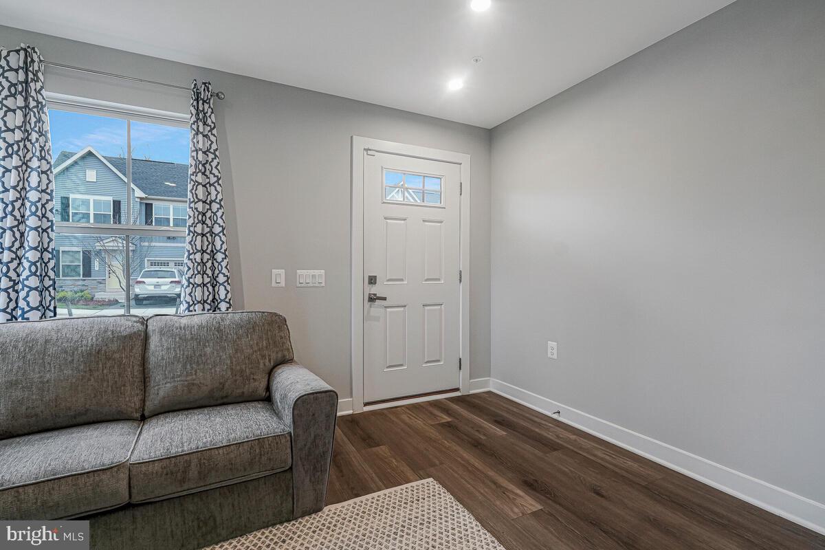 14380 Longhouse Loop Brandywine, MD 20613 - Photo 5 of 35 a living room with furniture and a window