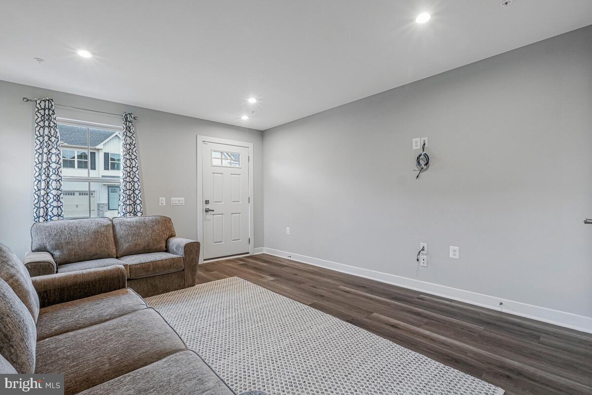 14380 Longhouse Loop Brandywine, MD 20613 - Photo 6 of 35 a living room with furniture and a window