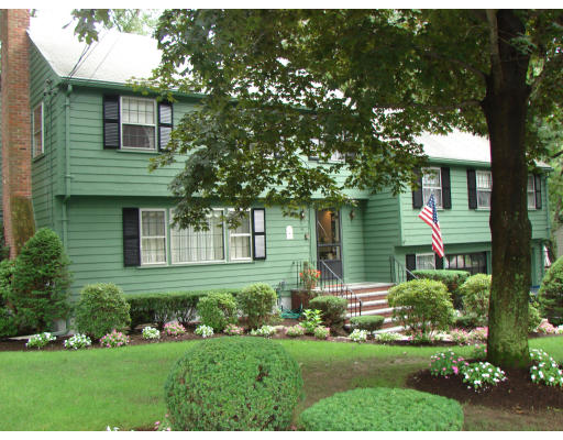 50 Aletha Road Needham, MA 02492 - Photo 1 of 12 a front view of a house with a yard