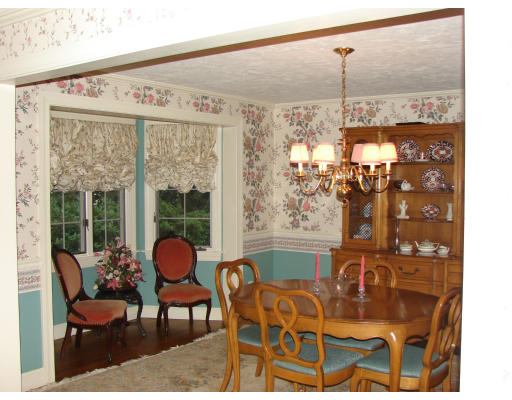 50 Aletha Road Needham, MA 02492 - Photo 3 of 12 a view of a dining room with furniture window and outside view
