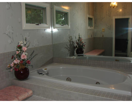 50 Aletha Road Needham, MA 02492 - Photo 7 of 12 a bathroom with a tub
