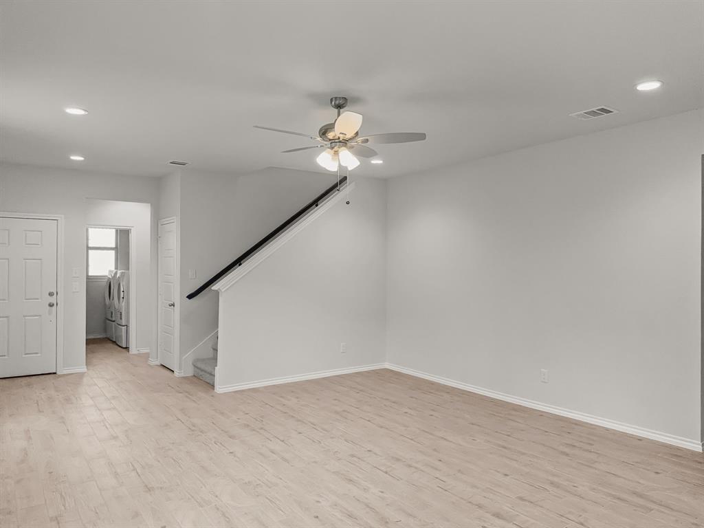1908 Iris Road Melissa, TX 75454 - Photo 12 of 30 wooden floor in an empty room with a window