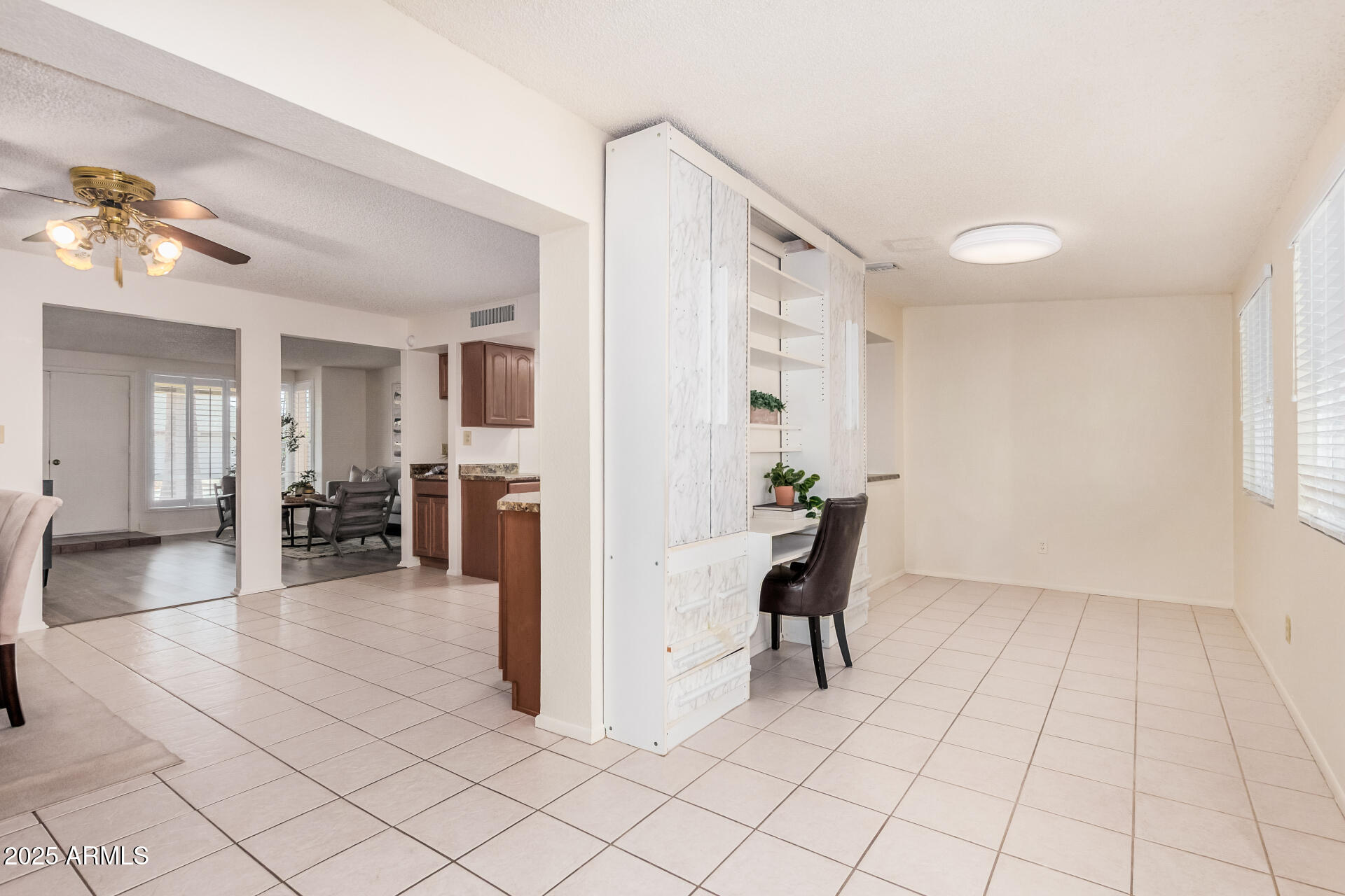 10512 West Ruth Avenue Peoria, AZ 85345 - Photo 17 of 33 a view of a livingroom with furniture and a dinning area
