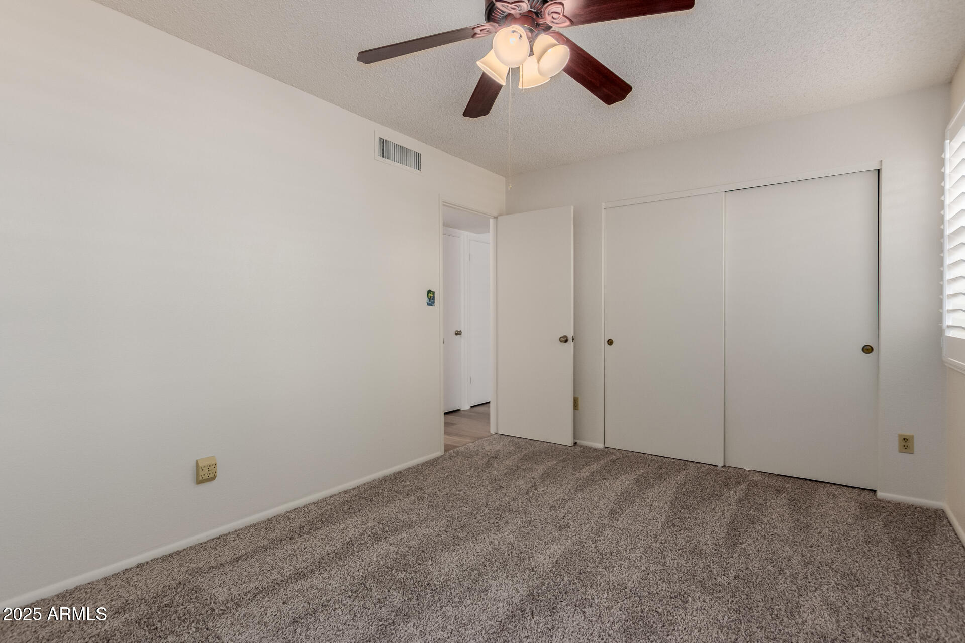 10512 West Ruth Avenue Peoria, AZ 85345 - Photo 21 of 33 a view of an empty room