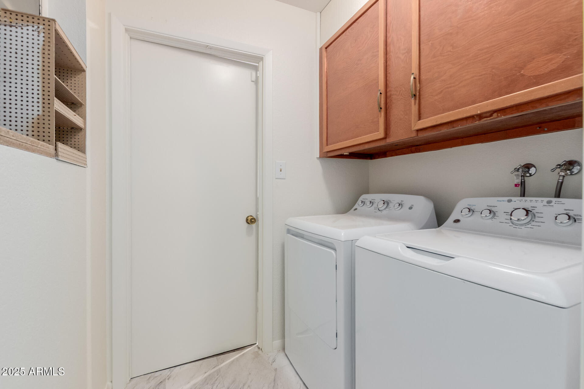 10512 West Ruth Avenue Peoria, AZ 85345 - Photo 23 of 33 a utility room with dryer and washer