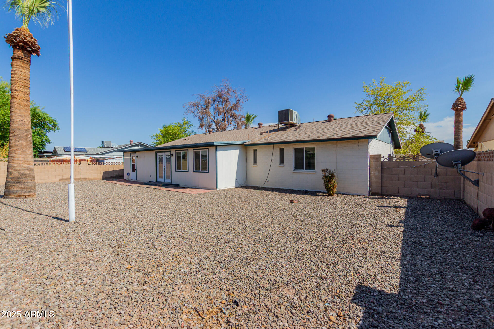 10512 West Ruth Avenue Peoria, AZ 85345 - Photo 26 of 33 a view of a house with a patio