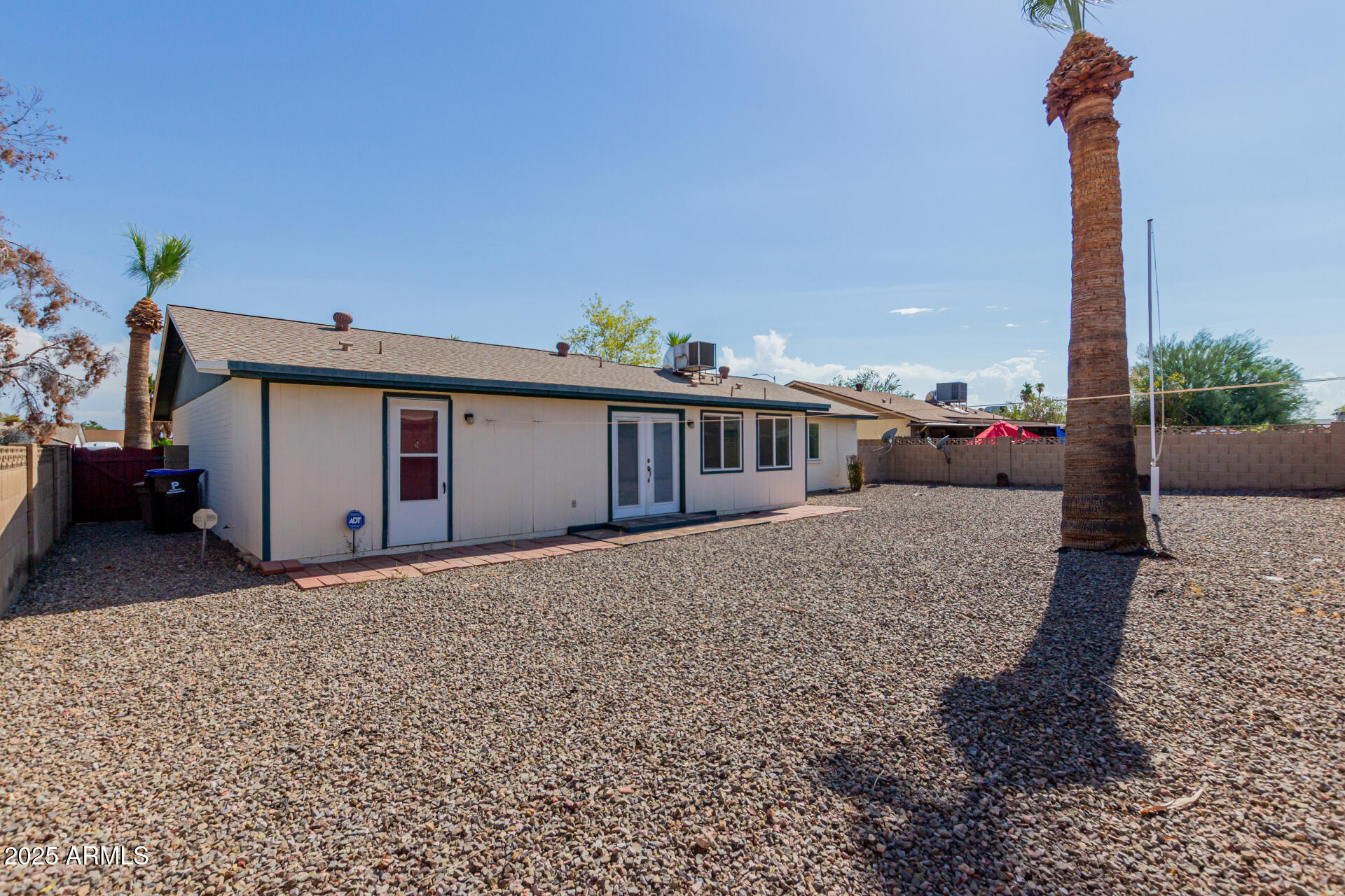 10512 West Ruth Avenue Peoria, AZ 85345 - Photo 27 of 33 a view of a house with a patio