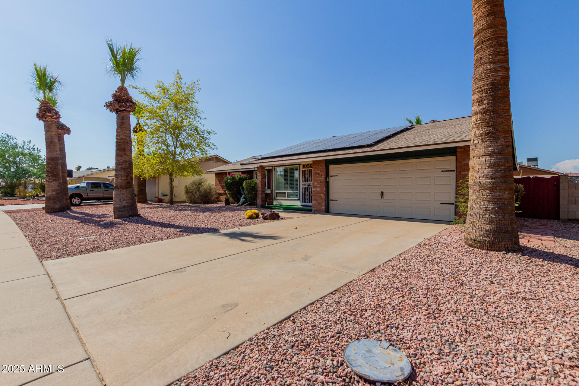 10512 West Ruth Avenue Peoria, AZ 85345 - Photo 33 of 33 a house view with a backyard space