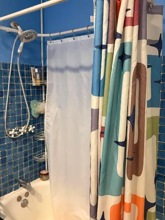 a utility room with sink dryer and washer